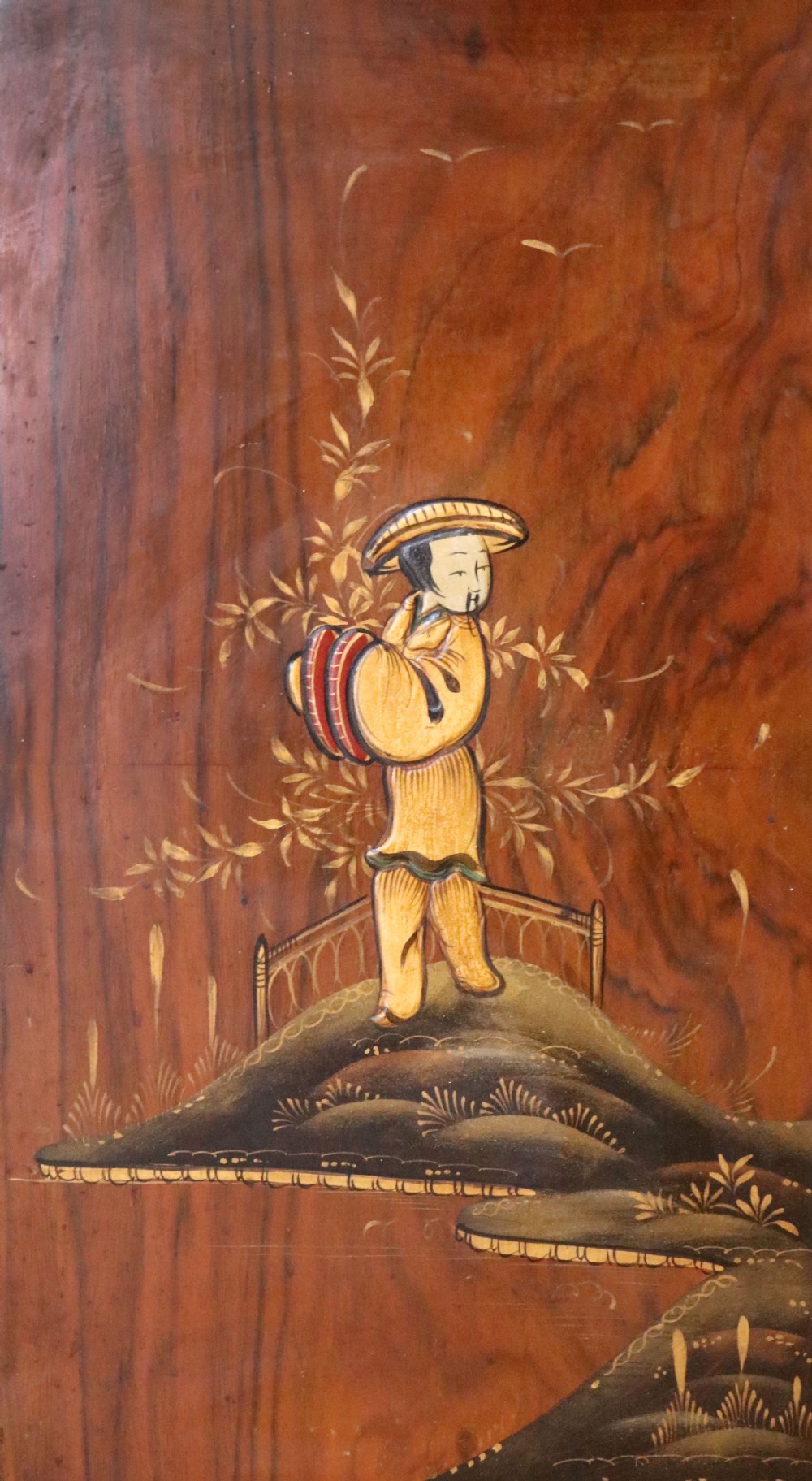A wonderfully stylish piece of retro furniture An Art Deco walnut and chinoiserie-decorated cabinet by Rivington.  View XXII