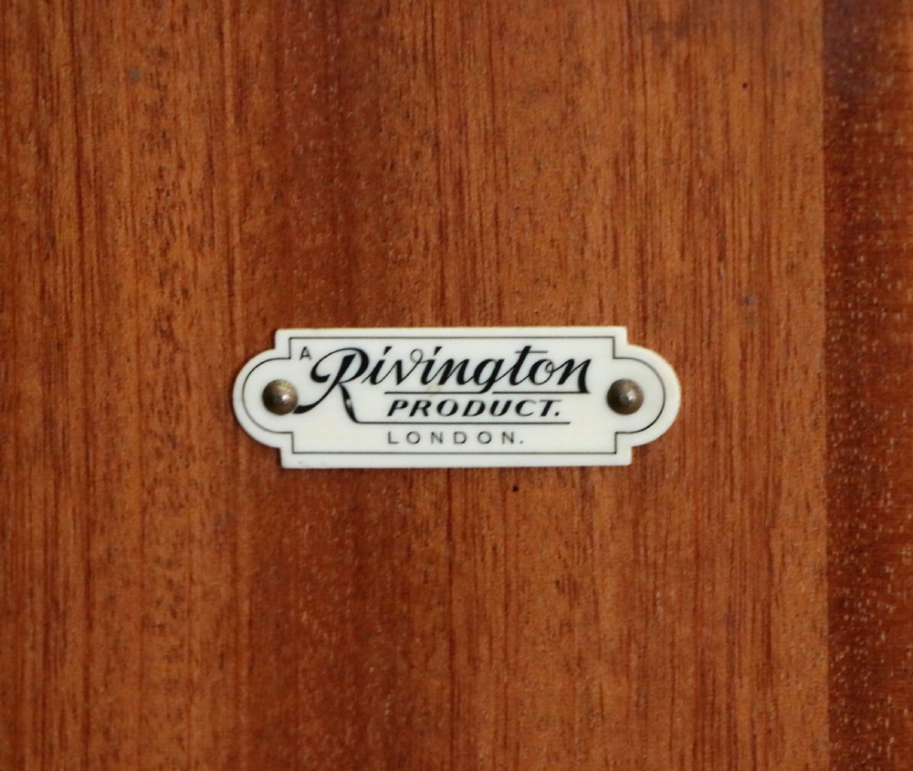 A wonderfully stylish piece of retro furniture An Art Deco walnut and chinoiserie-decorated cabinet by Rivington.  View XXVII