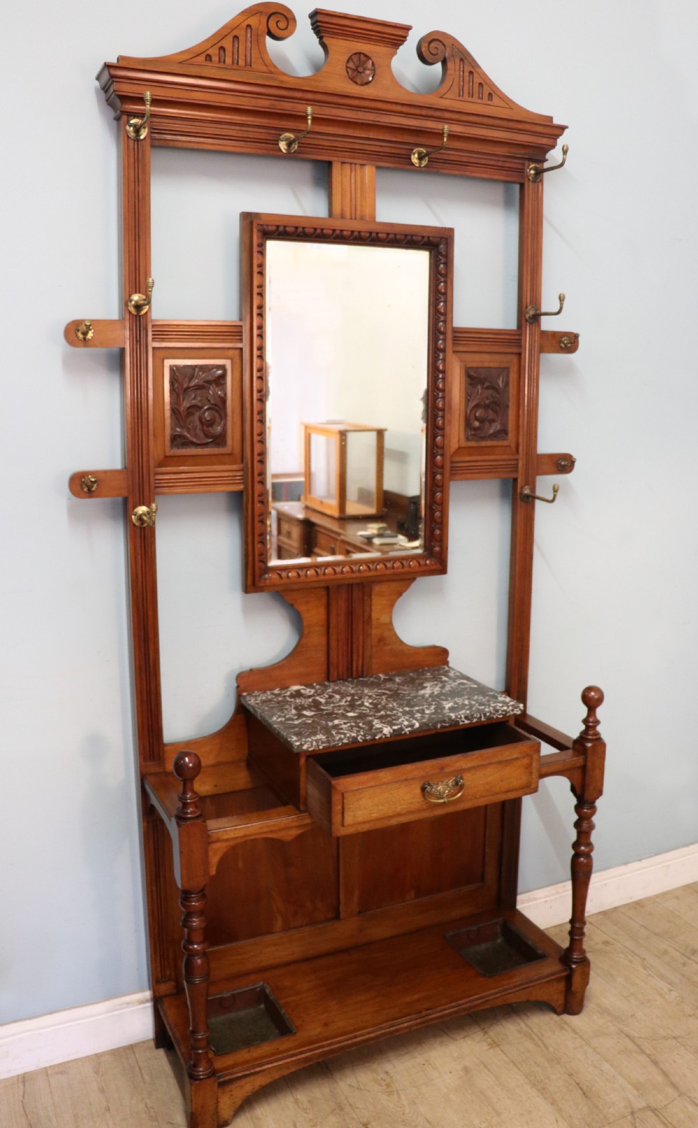 A late Victorian American walnut hallstand. View IV