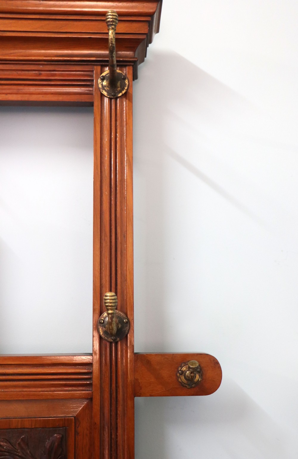A late Victorian American walnut hallstand. View XV