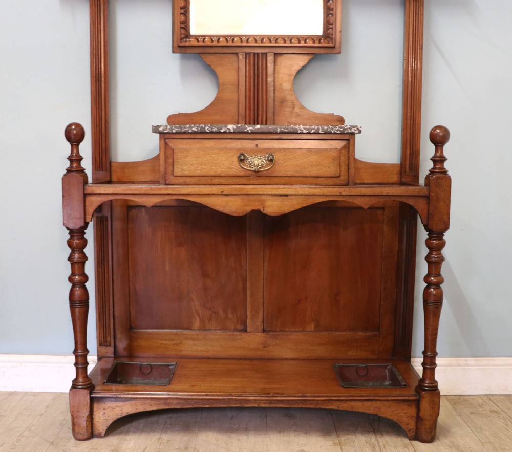 A late Victorian American walnut hallstand. View XXI