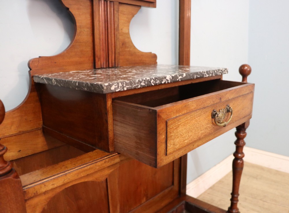 A late Victorian American walnut hallstand. View XXIII