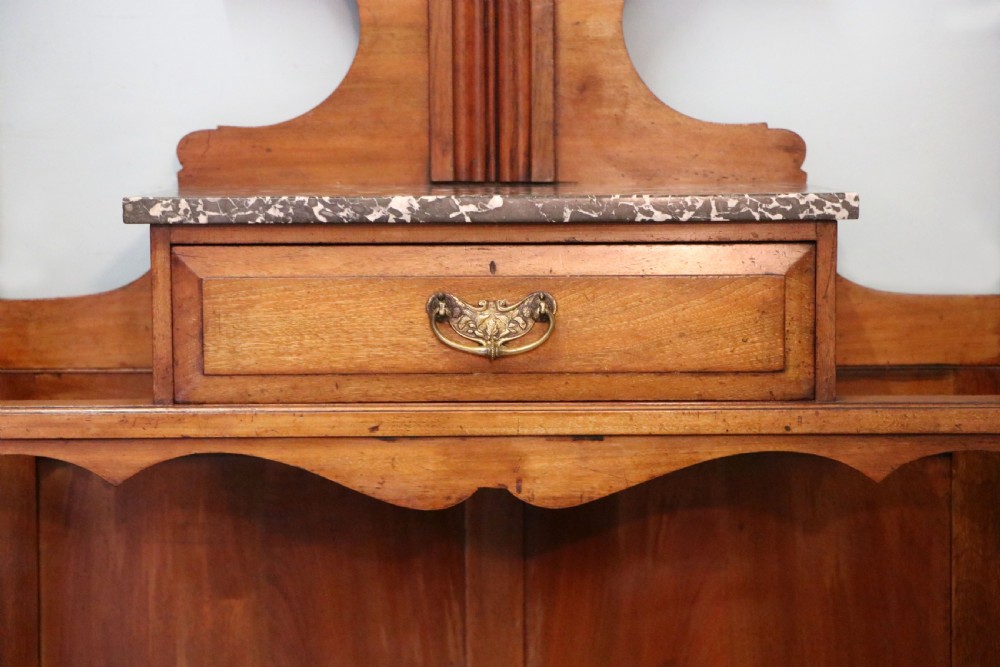 A late Victorian American walnut hallstand. View XXVI