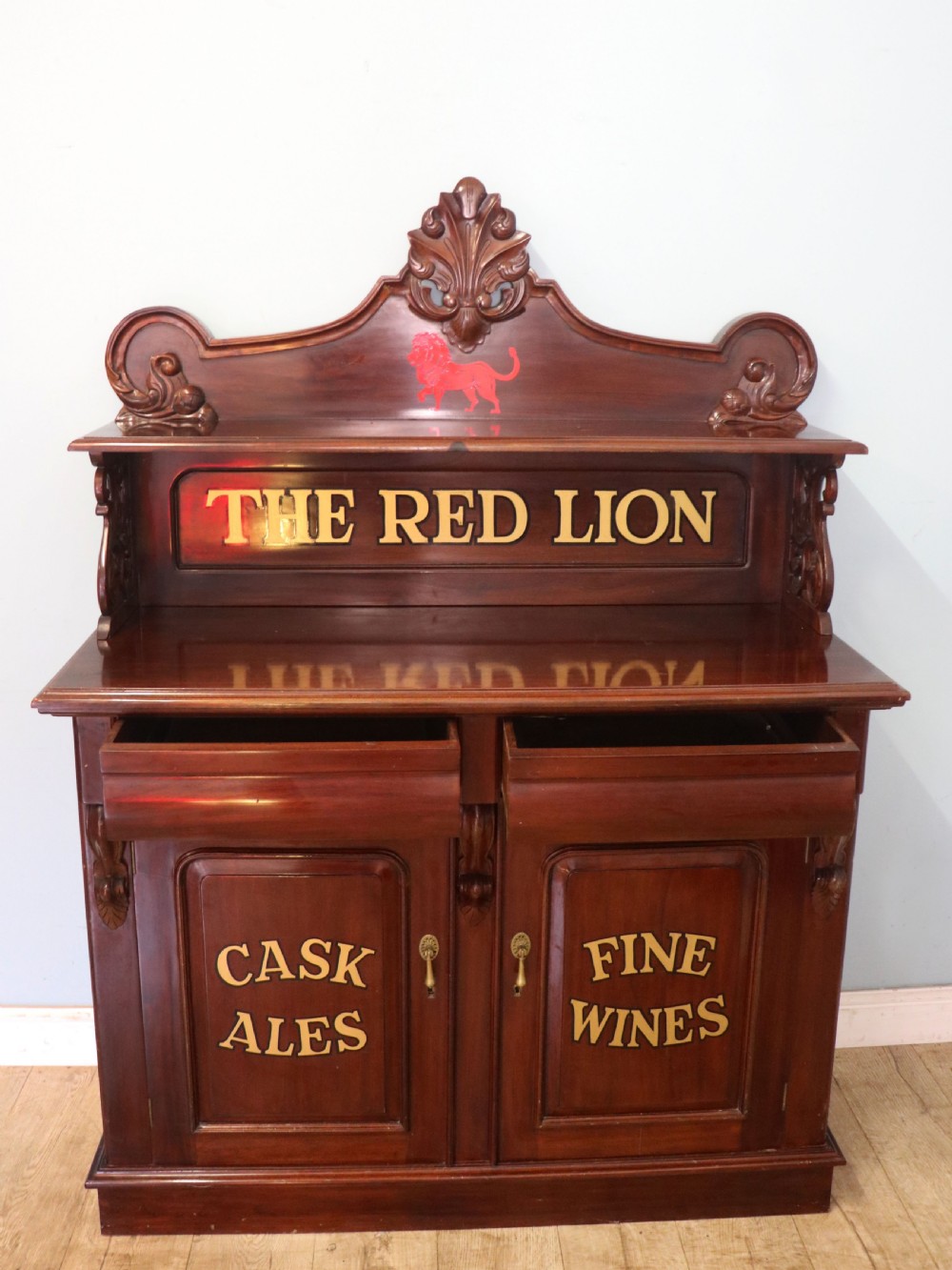 A Victorian mahogany chiffonier sideboard featuring hand-painted Red Lion pub lettering on the upper shelf back and lower cupboard doors. View II