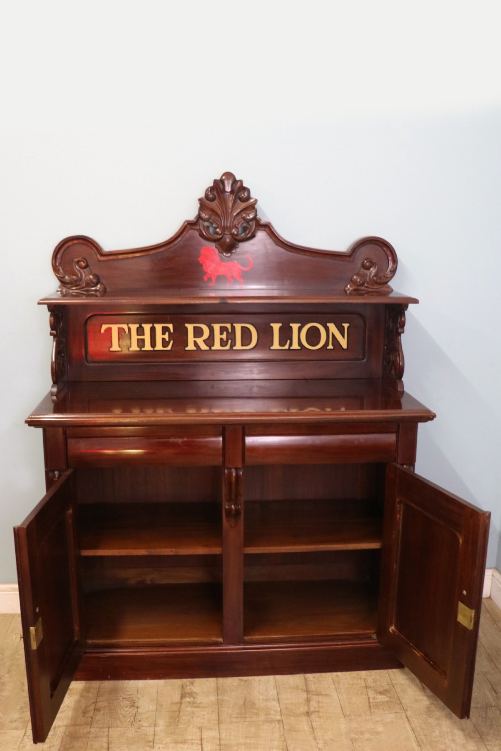 A Victorian mahogany chiffonier sideboard featuring hand-painted Red Lion pub lettering on the upper shelf back and lower cupboard doors. View III