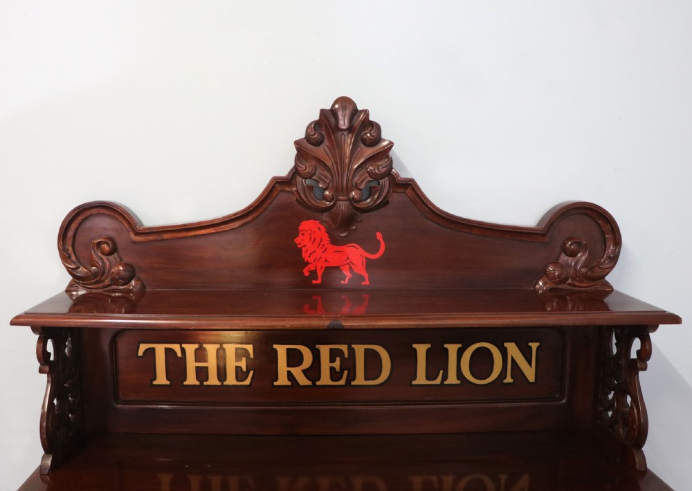 A Victorian mahogany chiffonier sideboard featuring hand-painted Red Lion pub lettering on the upper shelf back and lower cupboard doors. View VII