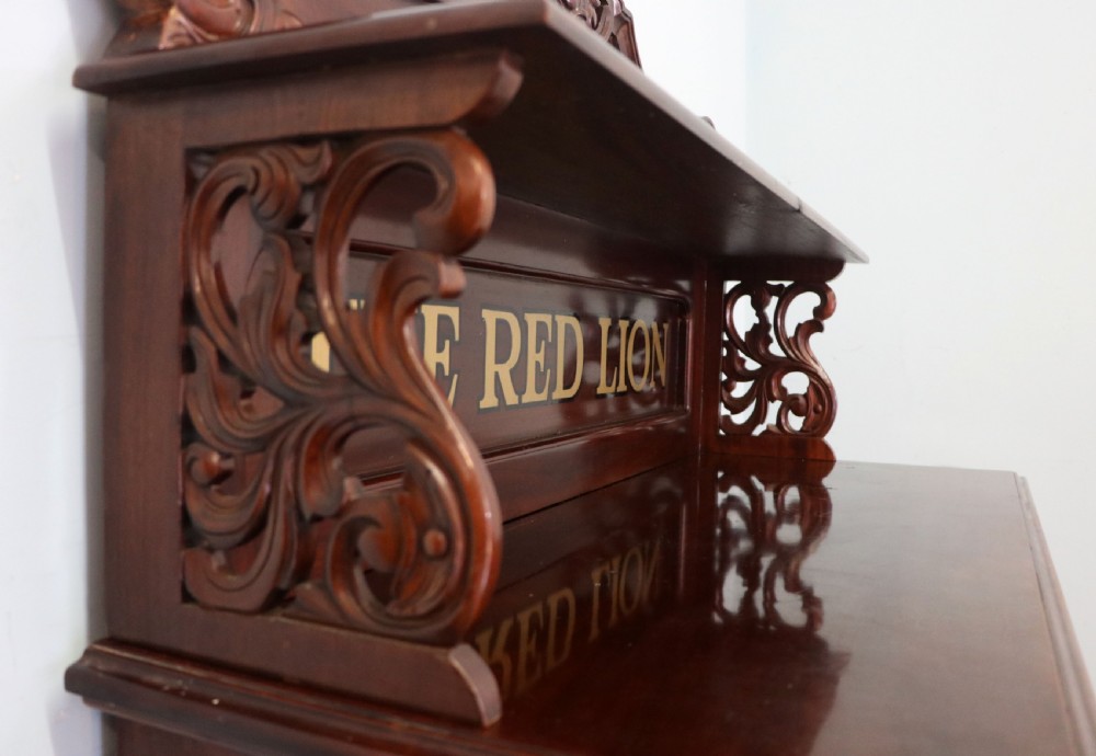 A Victorian mahogany chiffonier sideboard featuring hand-painted Red Lion pub lettering on the upper shelf back and lower cupboard doors. View XV