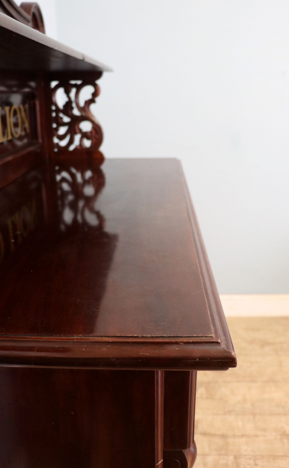 A Victorian mahogany chiffonier sideboard featuring hand-painted Red Lion pub lettering on the upper shelf back and lower cupboard doors. View XVIII