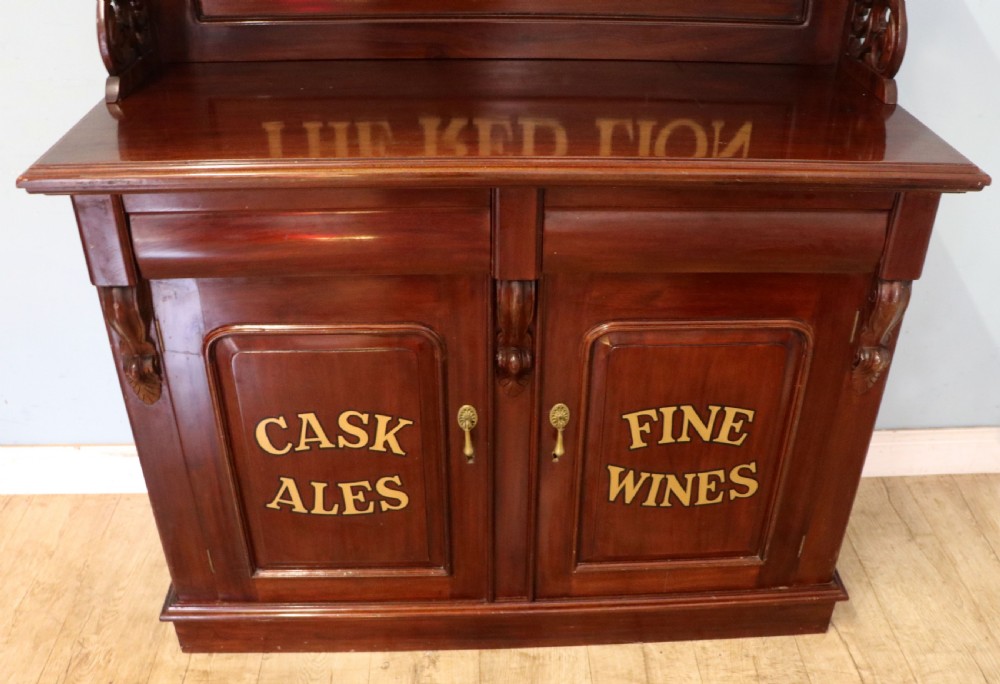 A Victorian mahogany chiffonier sideboard featuring hand-painted Red Lion pub lettering on the upper shelf back and lower cupboard doors. View XXVI