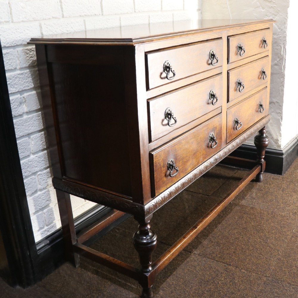 Oak side Quality British oak! A very useful Jacobean revival oak chest of drawers. View III