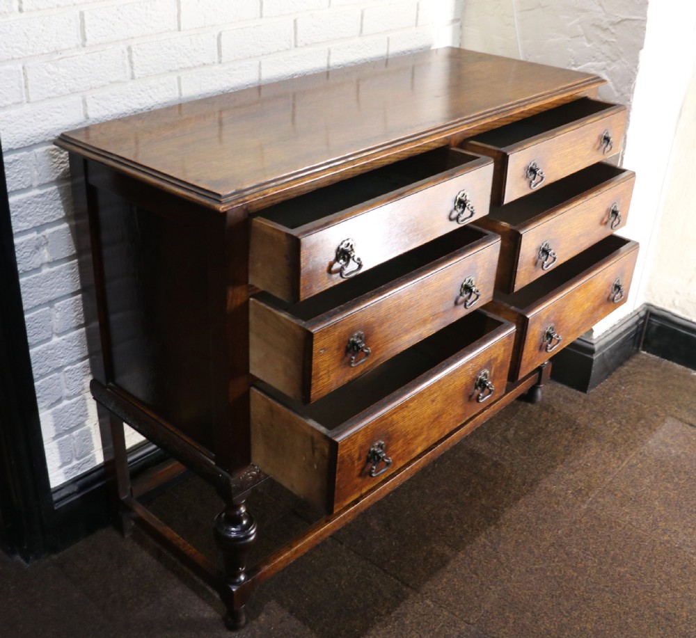 Oak side Quality British oak! A very useful Jacobean revival oak chest of drawers. View V