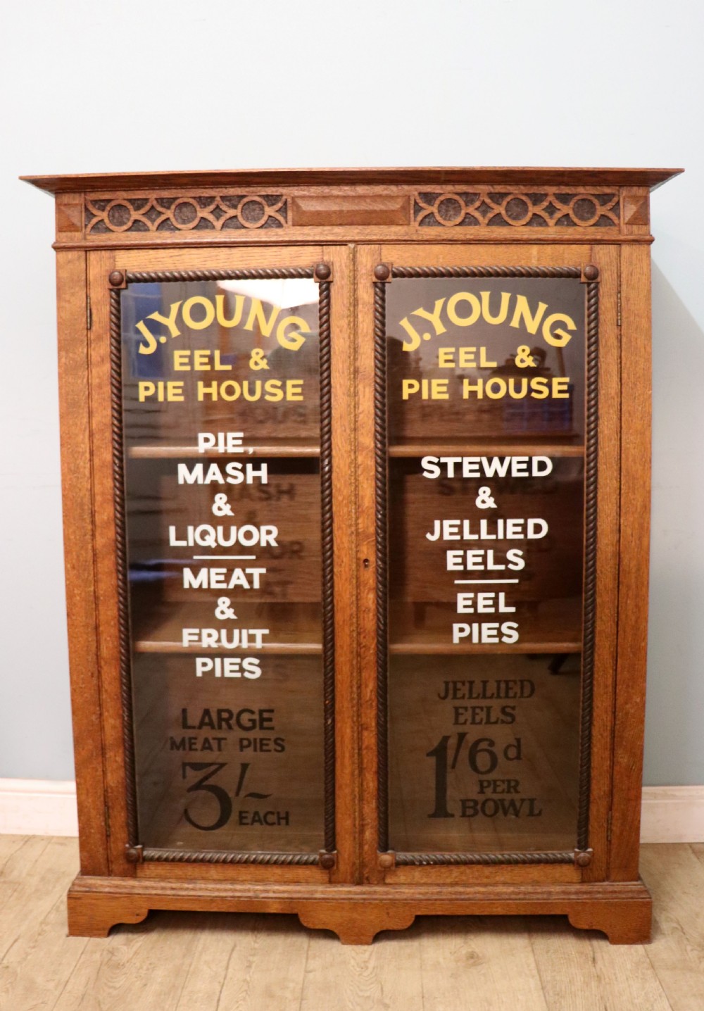 A simply charming 1930’s oak framed and glazed two door bookcase or display cabinet.