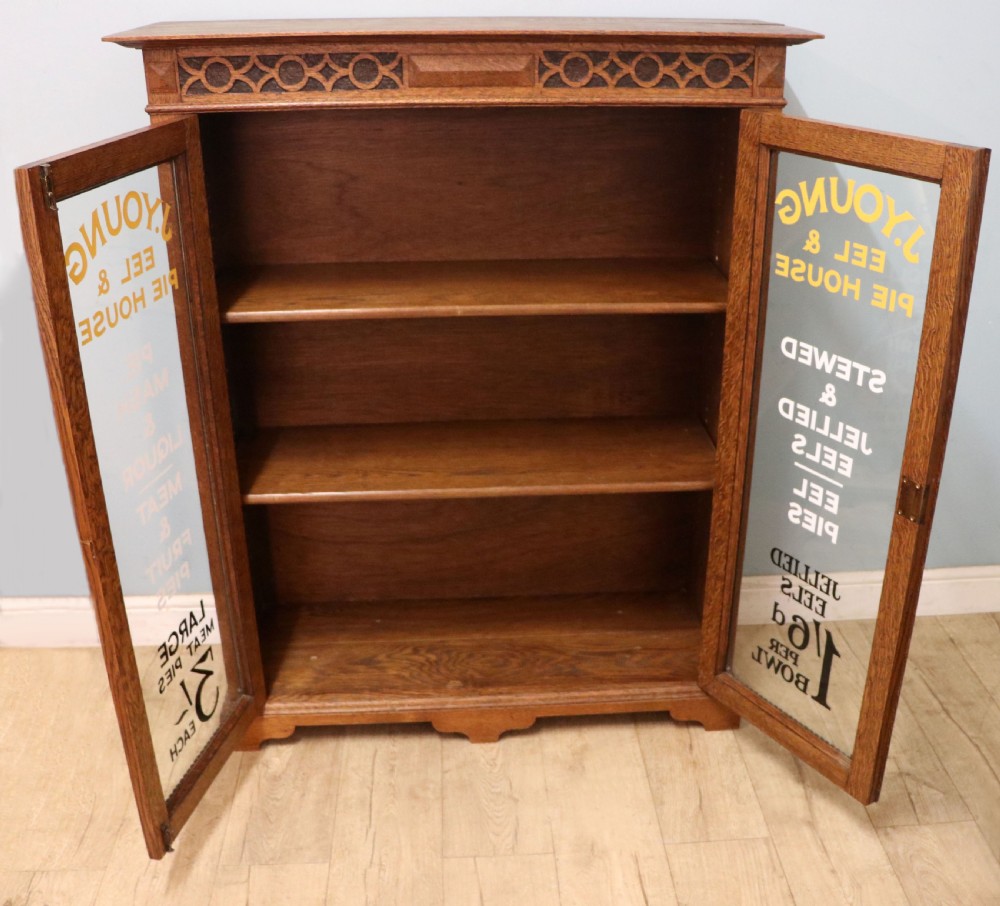 A simply charming 1930’s oak framed and glazed two door bookcase or display cabinet. View II
