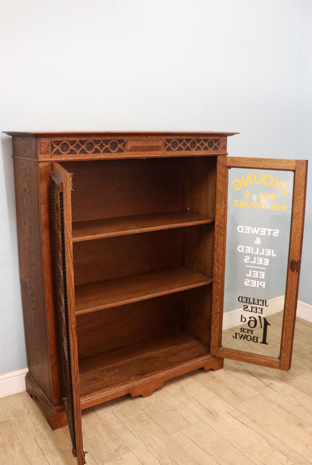 A simply charming 1930’s oak framed and glazed two door bookcase or display cabinet. View VI