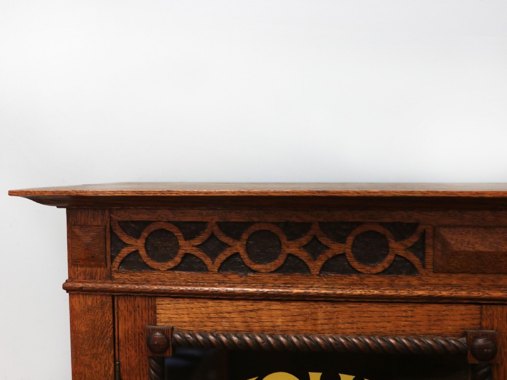 A simply charming 1930’s oak framed and glazed two door bookcase or display cabinet. View VII