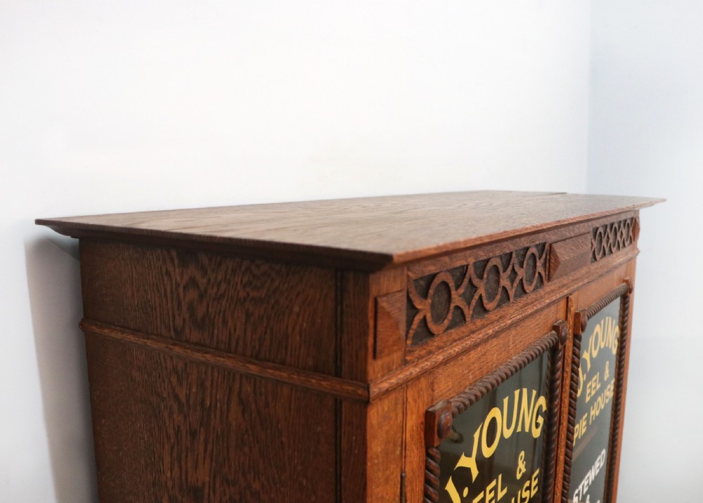 A simply charming 1930’s oak framed and glazed two door bookcase or display cabinet. View XIII