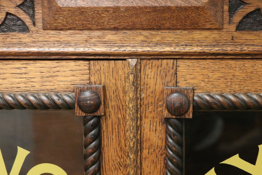 A simply charming 1930’s oak framed and glazed two door bookcase or display cabinet. View XV