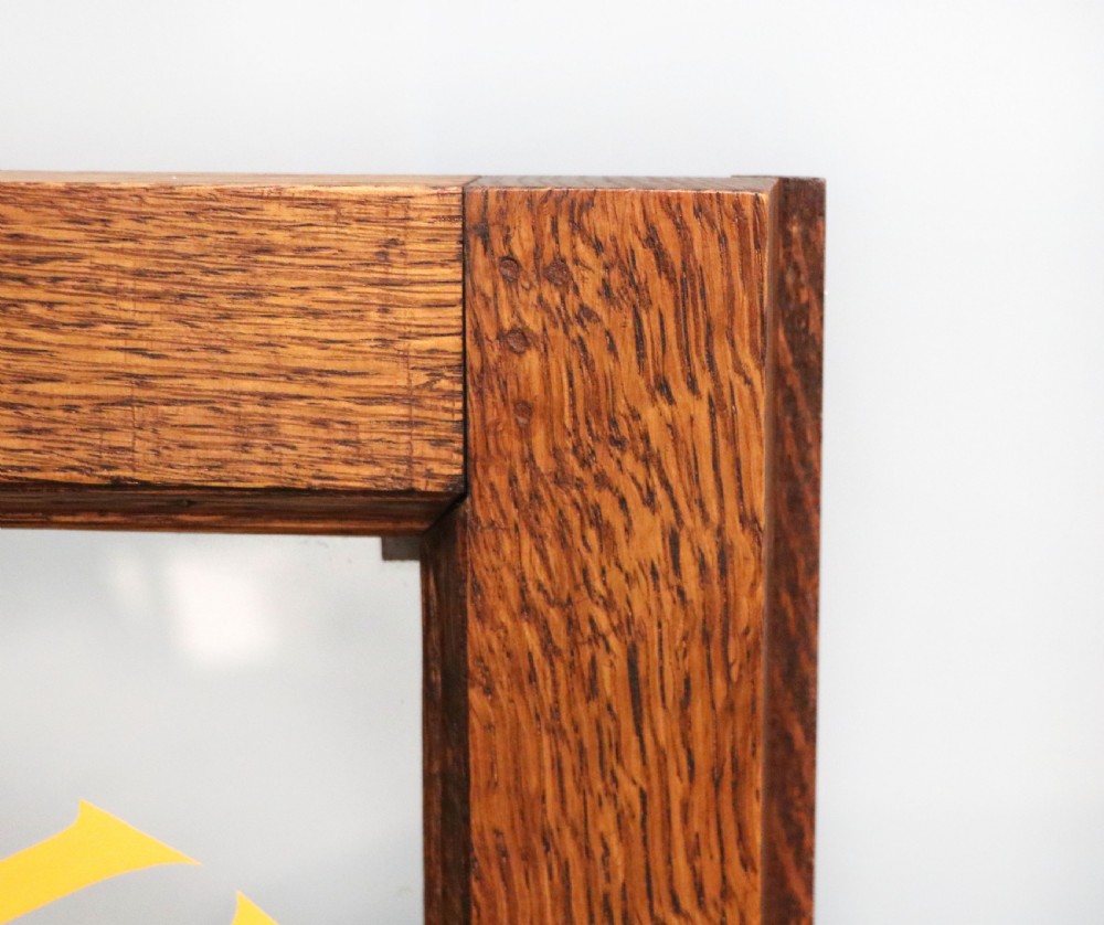 A simply charming 1930’s oak framed and glazed two door bookcase or display cabinet. View XXXI