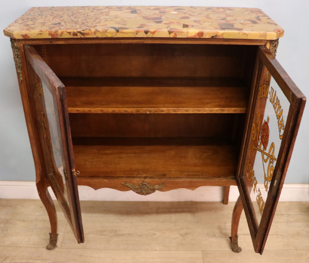 An early 20th-century French wooden display cabinet featuring a marble top, cabriole legs, gilt bronze mounts, and glass doors with hand-painted Chateauneuf-du-Pape lettering. View II