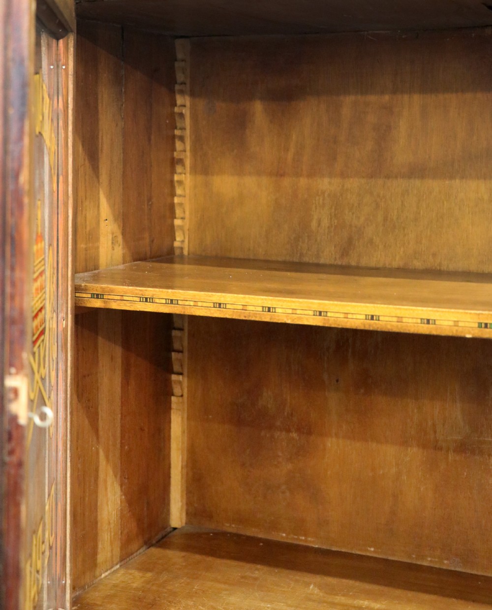 An early 20th-century French wooden display cabinet featuring a marble top, cabriole legs, gilt bronze mounts, and glass doors with hand-painted Chateauneuf-du-Pape lettering. View XXIII