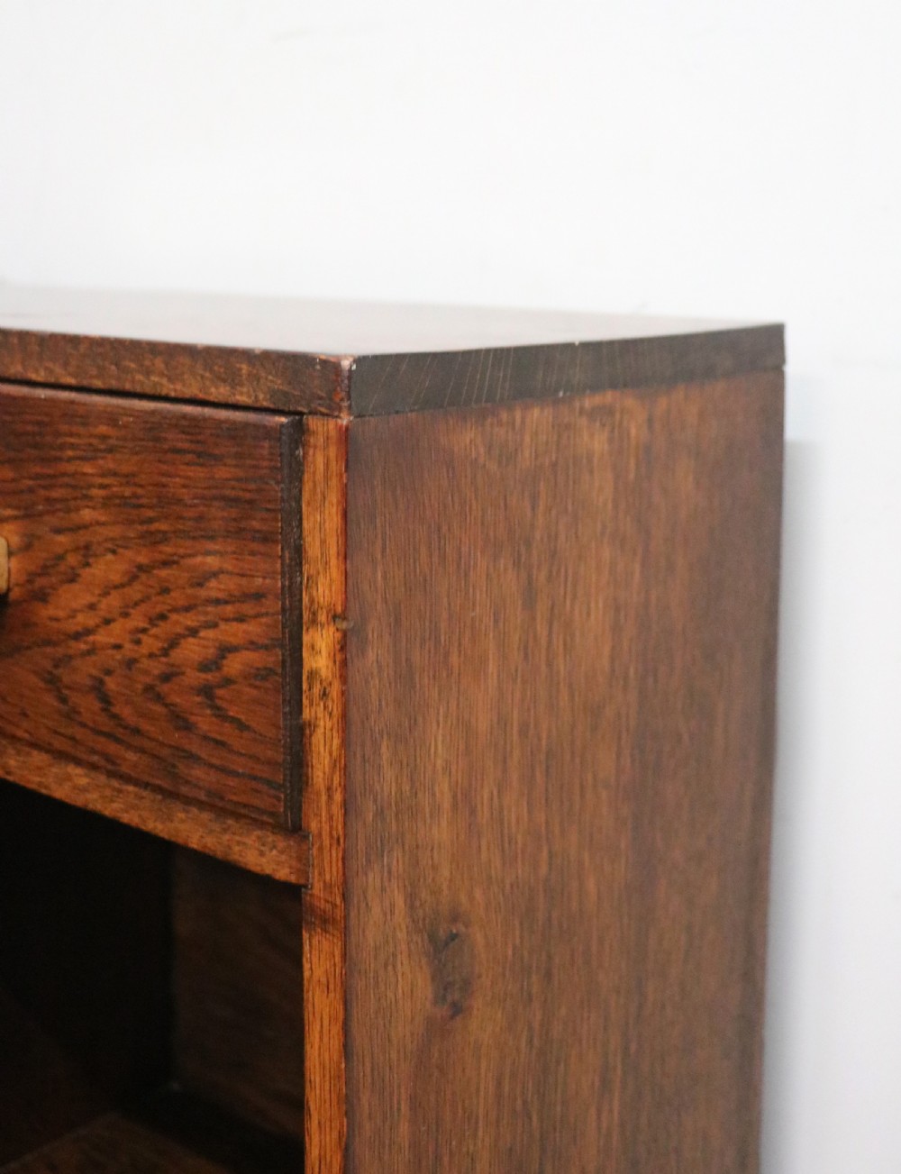 A lovely unusual oak corner bookcase dating to the 1920/30s.  View IX