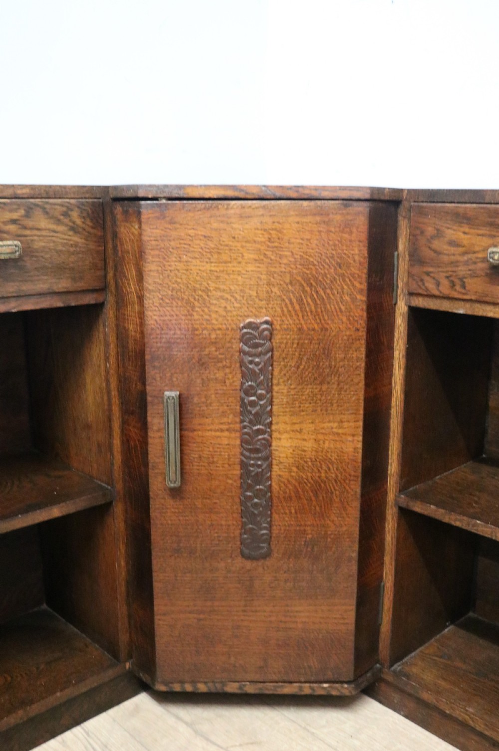 A lovely unusual oak corner bookcase dating to the 1920/30s.  View XII