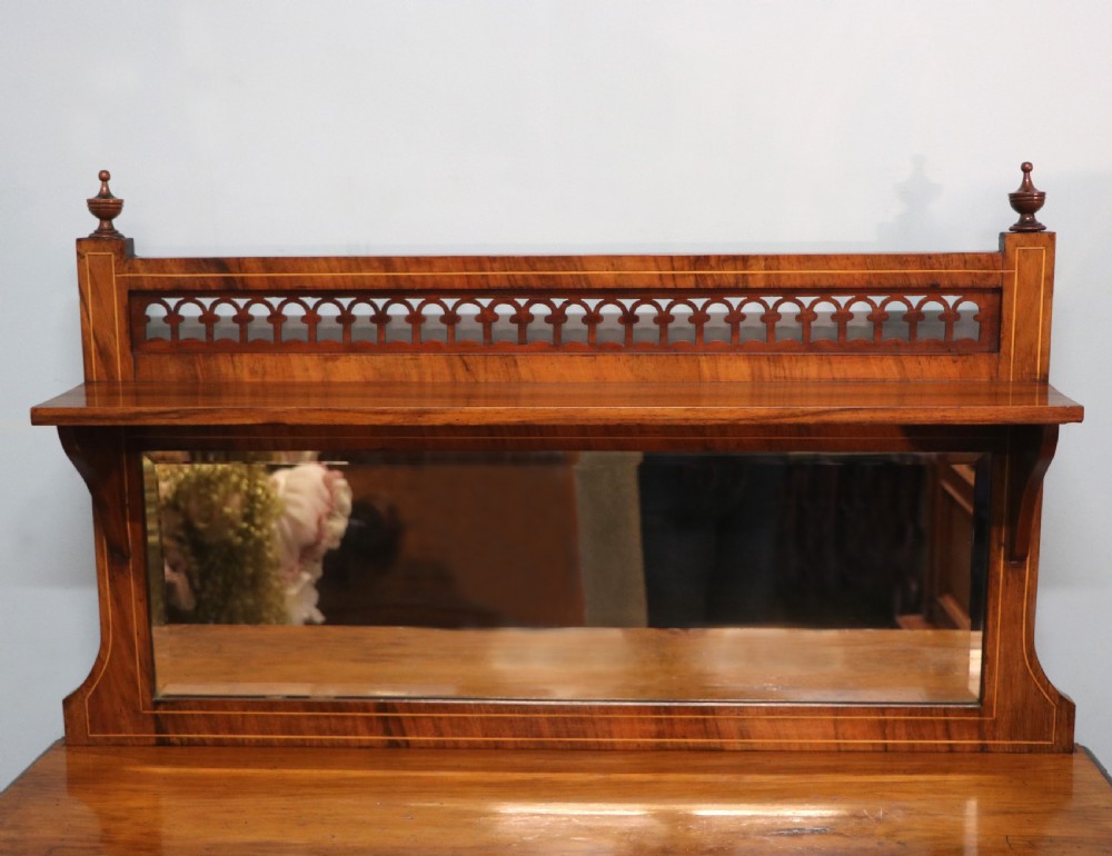 A lovely late Victorian walnut veneered and inlaid bookcase or display cabinet.  View VII
