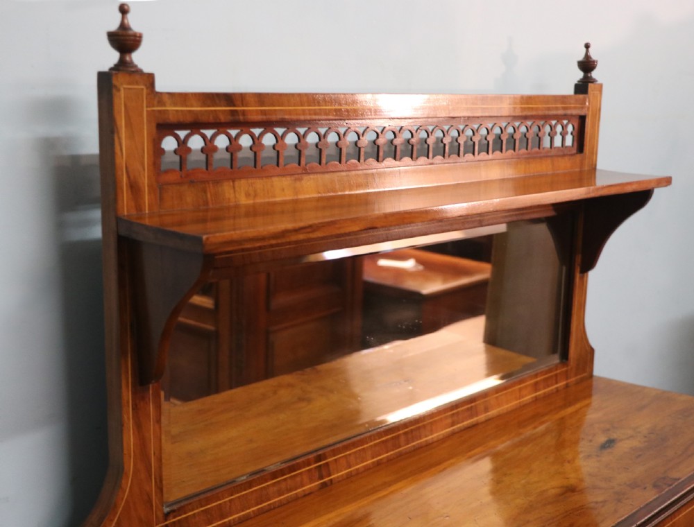 A lovely late Victorian walnut veneered and inlaid bookcase or display cabinet.  View VIII