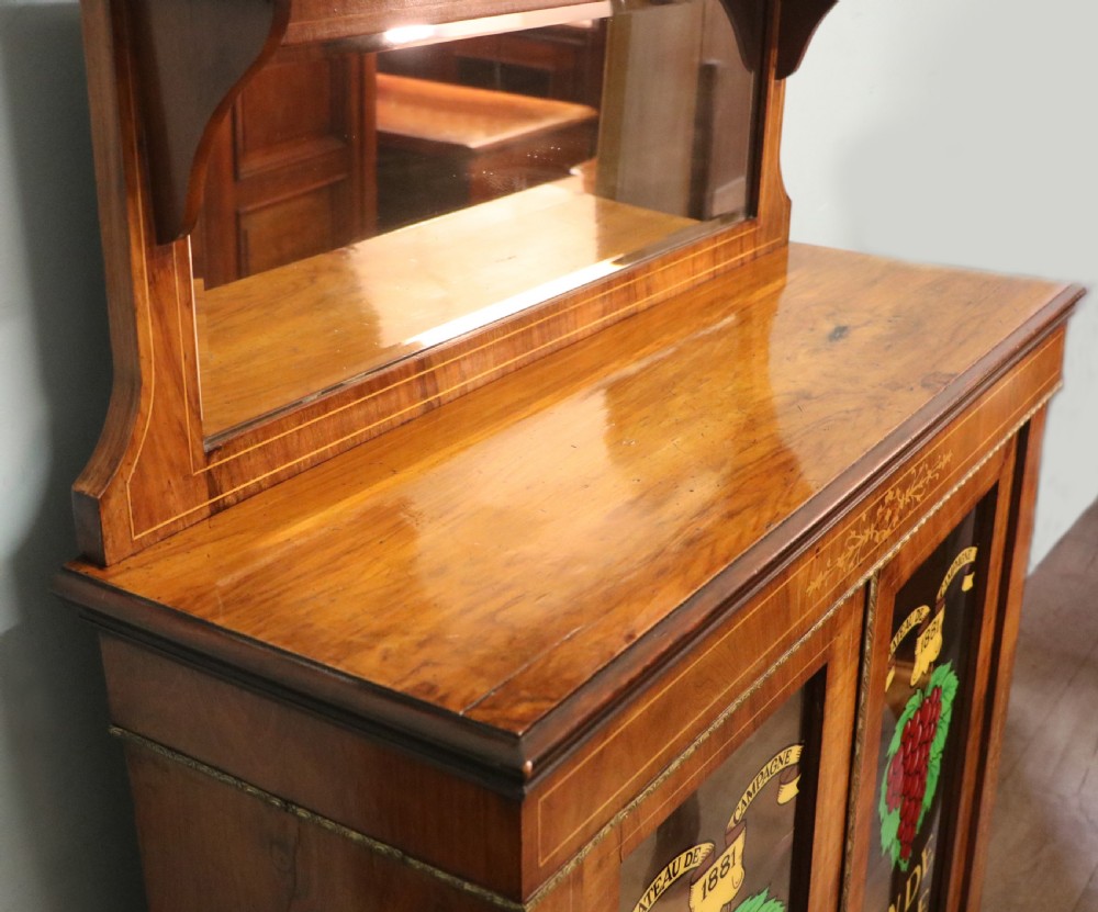 A lovely late Victorian walnut veneered and inlaid bookcase or display cabinet.  View XV