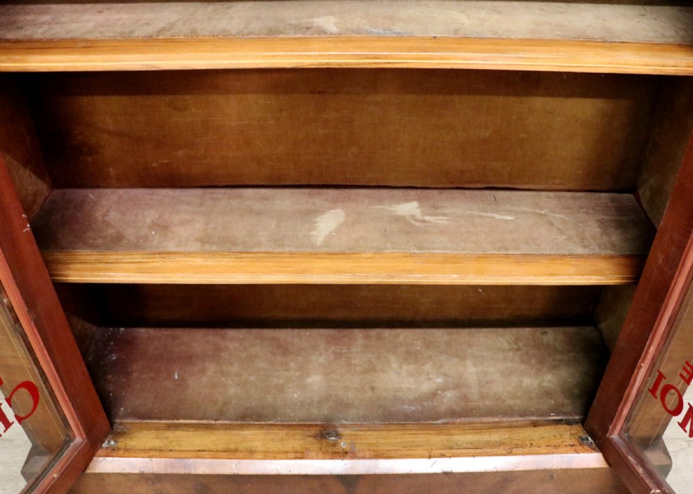 A lovely late Victorian walnut veneered and inlaid bookcase or display cabinet.  View XXII