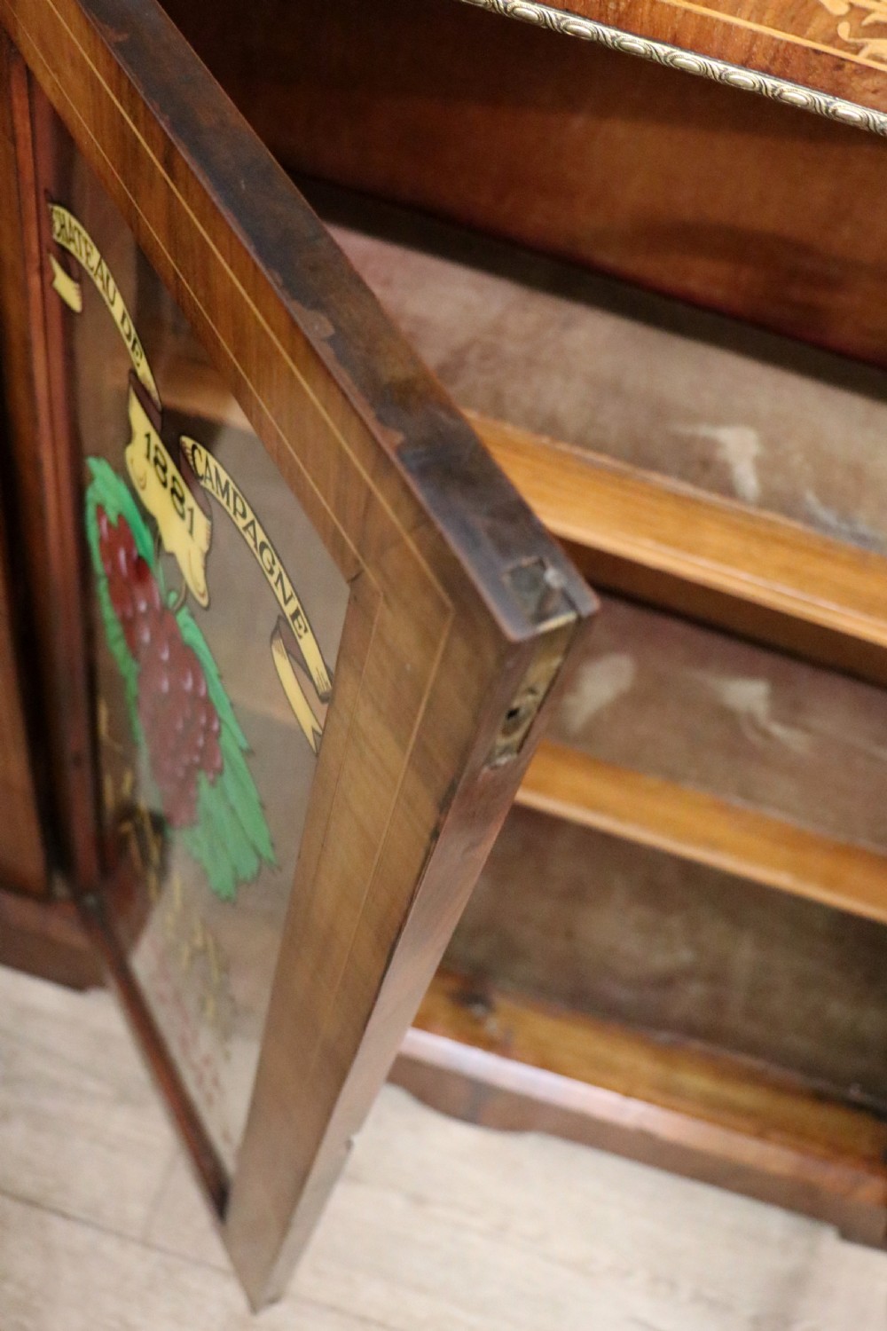 A lovely late Victorian walnut veneered and inlaid bookcase or display cabinet.  View XXIII