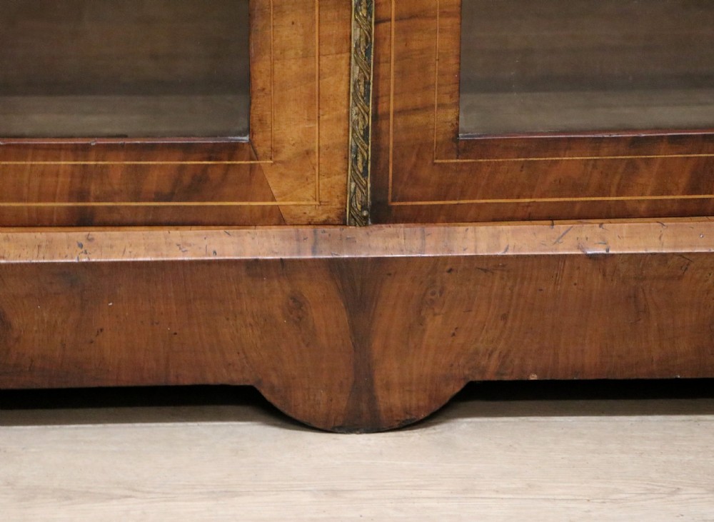 A lovely late Victorian walnut veneered and inlaid bookcase or display cabinet.  View XXIV
