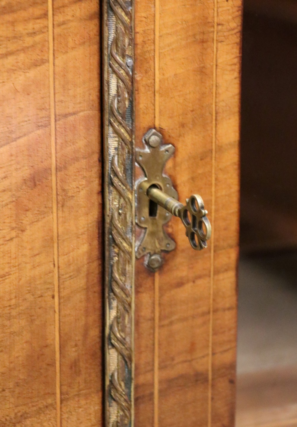 A lovely late Victorian walnut veneered and inlaid bookcase or display cabinet.  View XXV