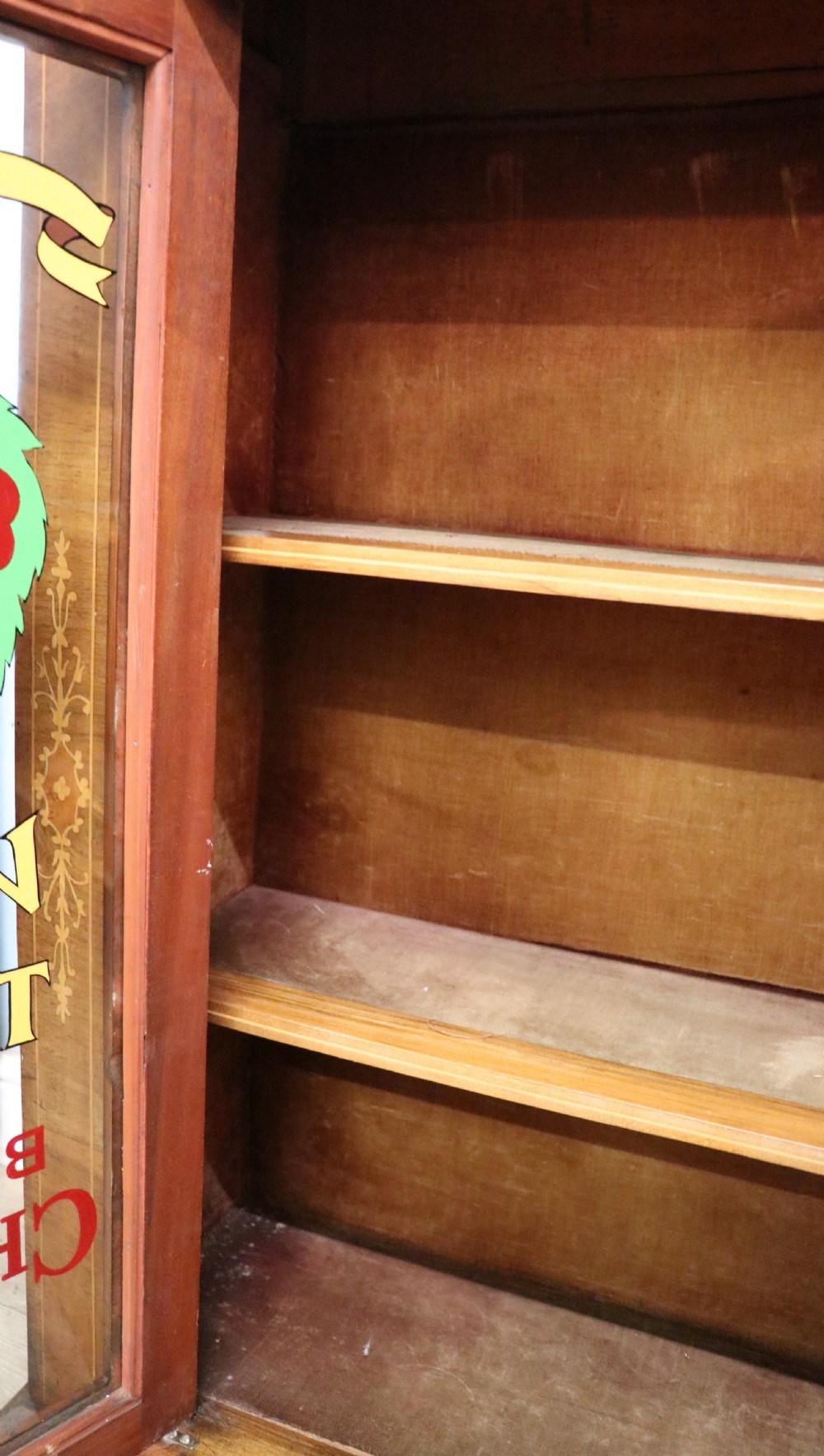 A lovely late Victorian walnut veneered and inlaid bookcase or display cabinet.  View XXVI