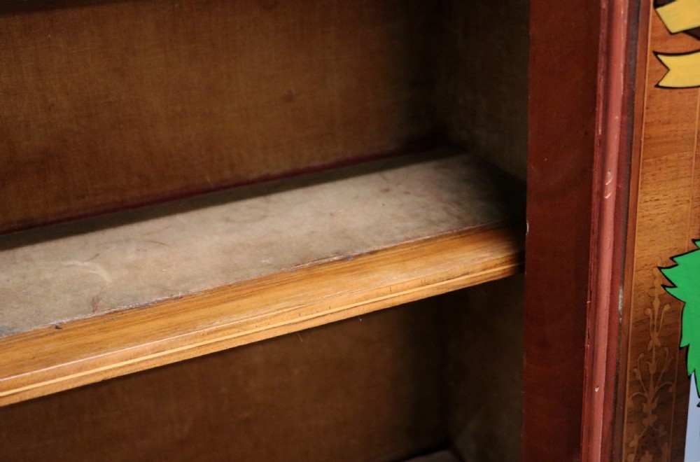 A lovely late Victorian walnut veneered and inlaid bookcase or display cabinet.  View XXVII