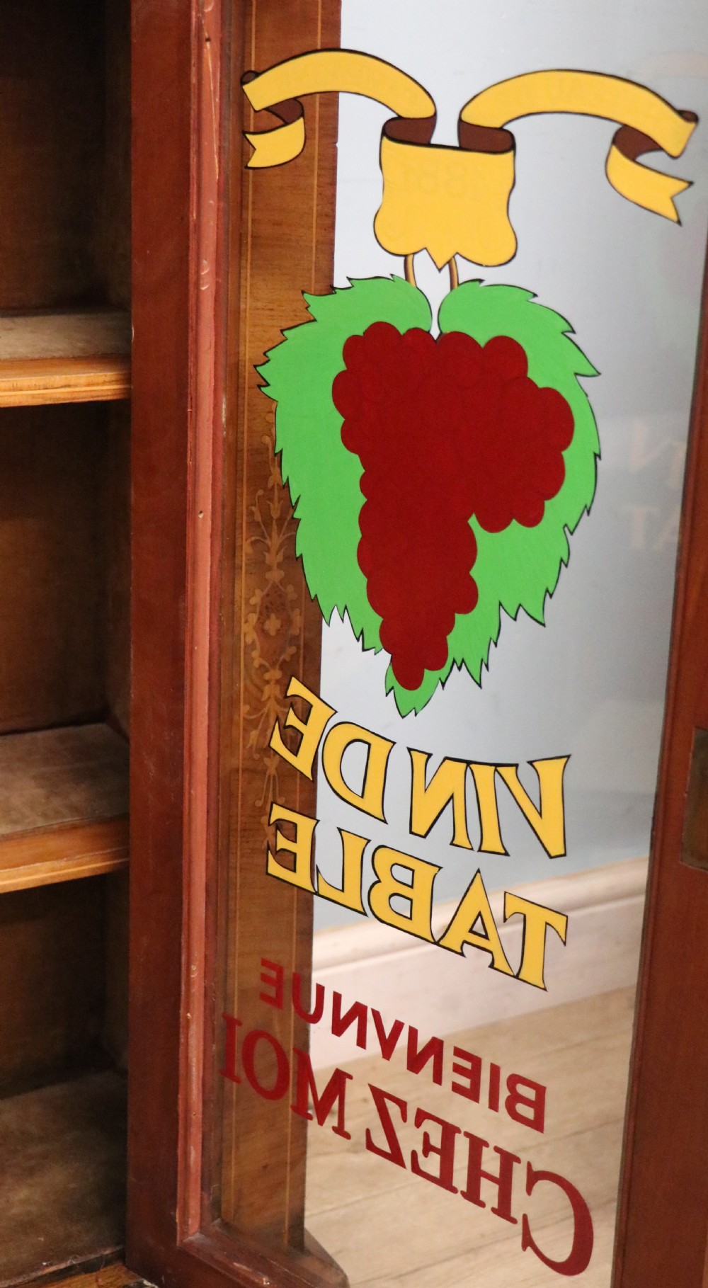 A lovely late Victorian walnut veneered and inlaid bookcase or display cabinet.  View XXVIII