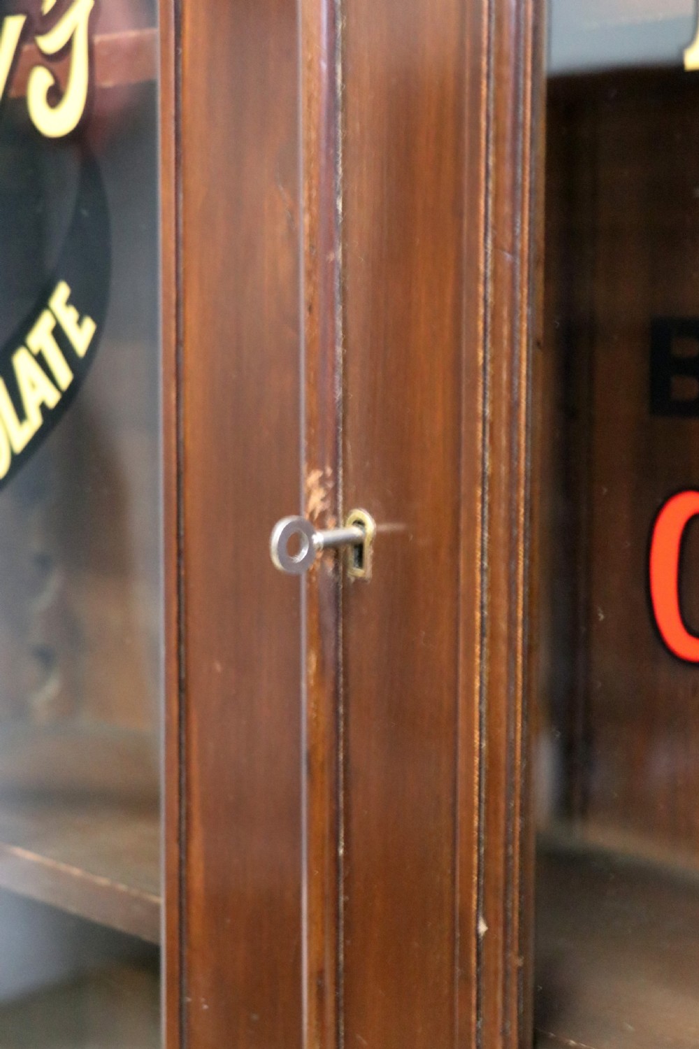 A late Victorian mahogany bookcase or display cabinet, later hand sign written for Fry’s cocoa and chocolate.  View XV