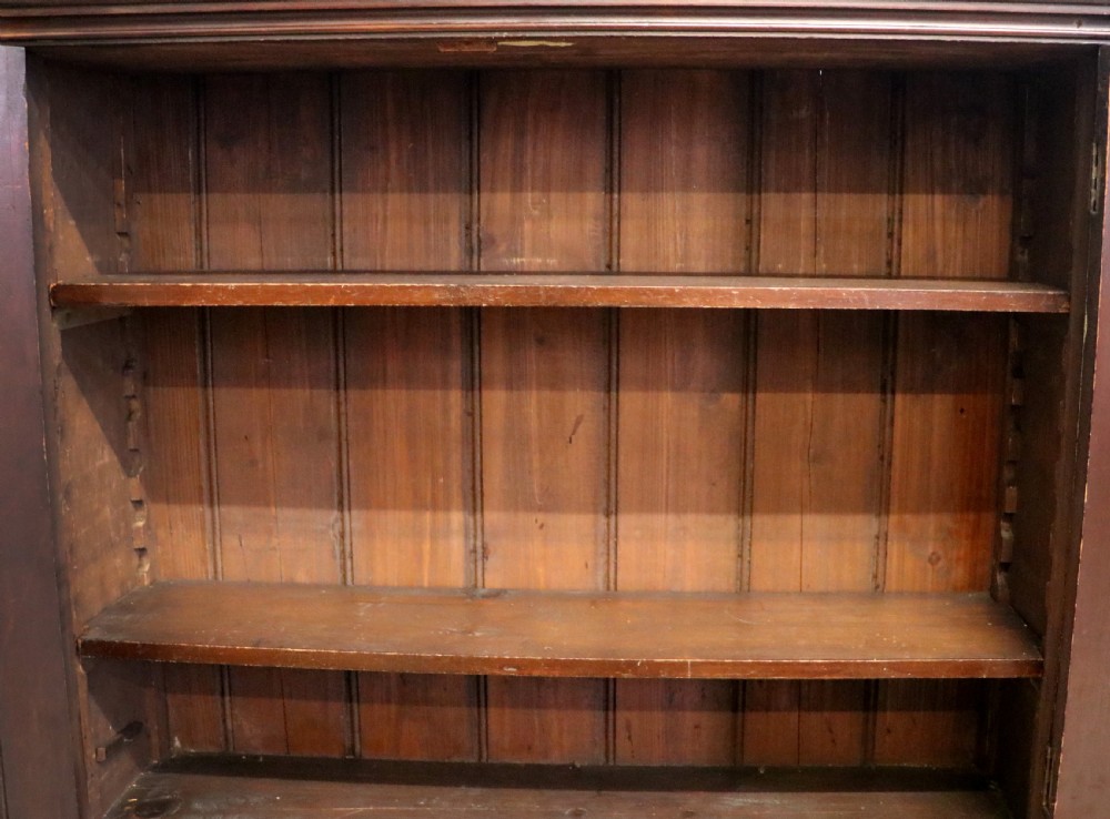 A late Victorian mahogany bookcase or display cabinet, later hand sign written for Fry’s cocoa and chocolate.  View XVI