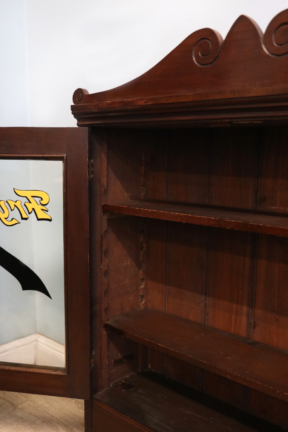 A late Victorian mahogany bookcase or display cabinet, later hand sign written for Fry’s cocoa and chocolate.  View XVII