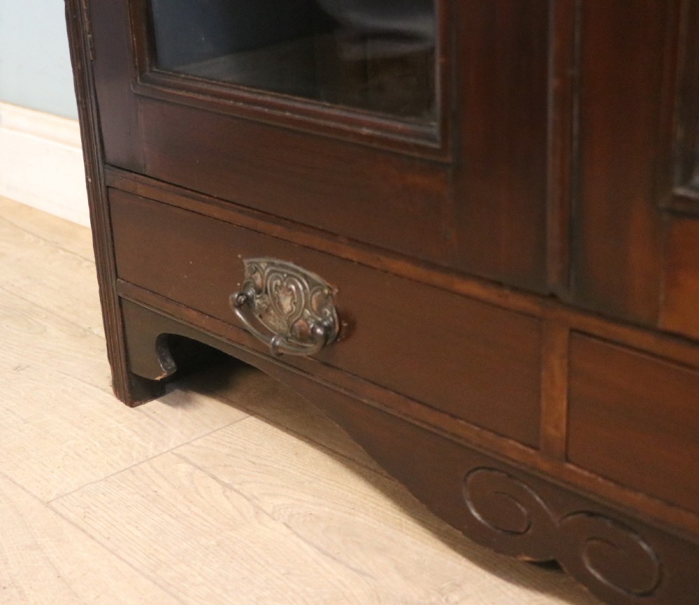 A late Victorian mahogany bookcase or display cabinet, later hand sign written for Fry’s cocoa and chocolate.  View XXII