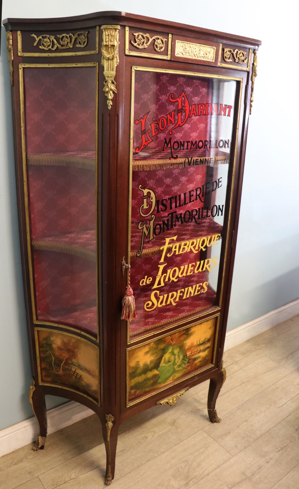 A very fine 20th century Vernis Martin style vitrine display cabinet, later sign written for Leon Dardant distillery of Vienna. View IV