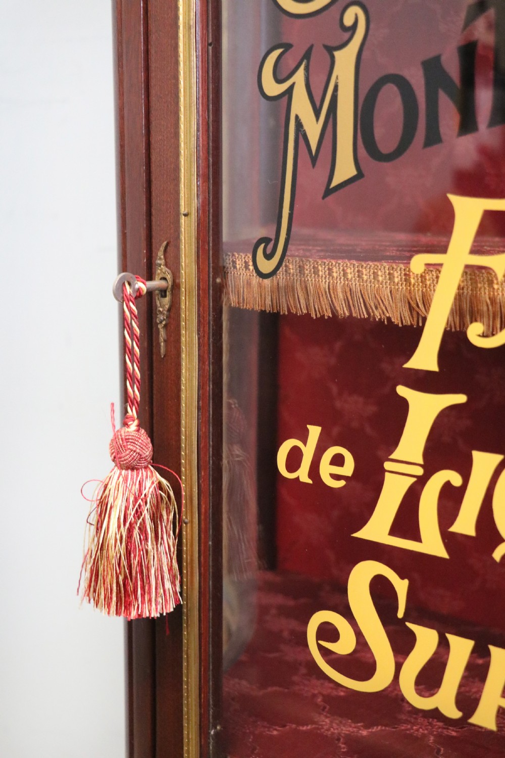 A very fine 20th century Vernis Martin style vitrine display cabinet, later sign written for Leon Dardant distillery of Vienna. View XVIII