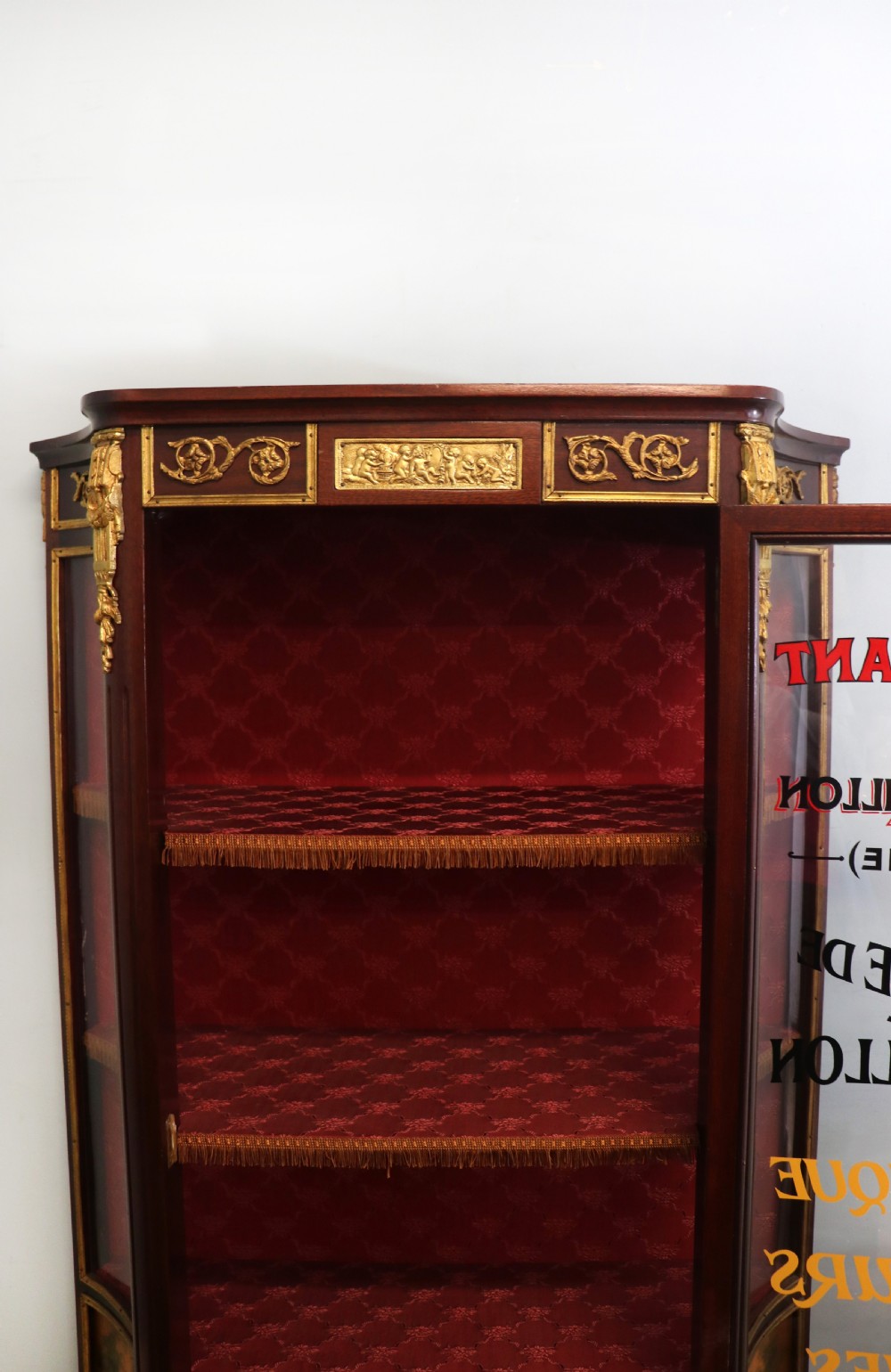 A very fine 20th century Vernis Martin style vitrine display cabinet, later sign written for Leon Dardant distillery of Vienna. View XXI