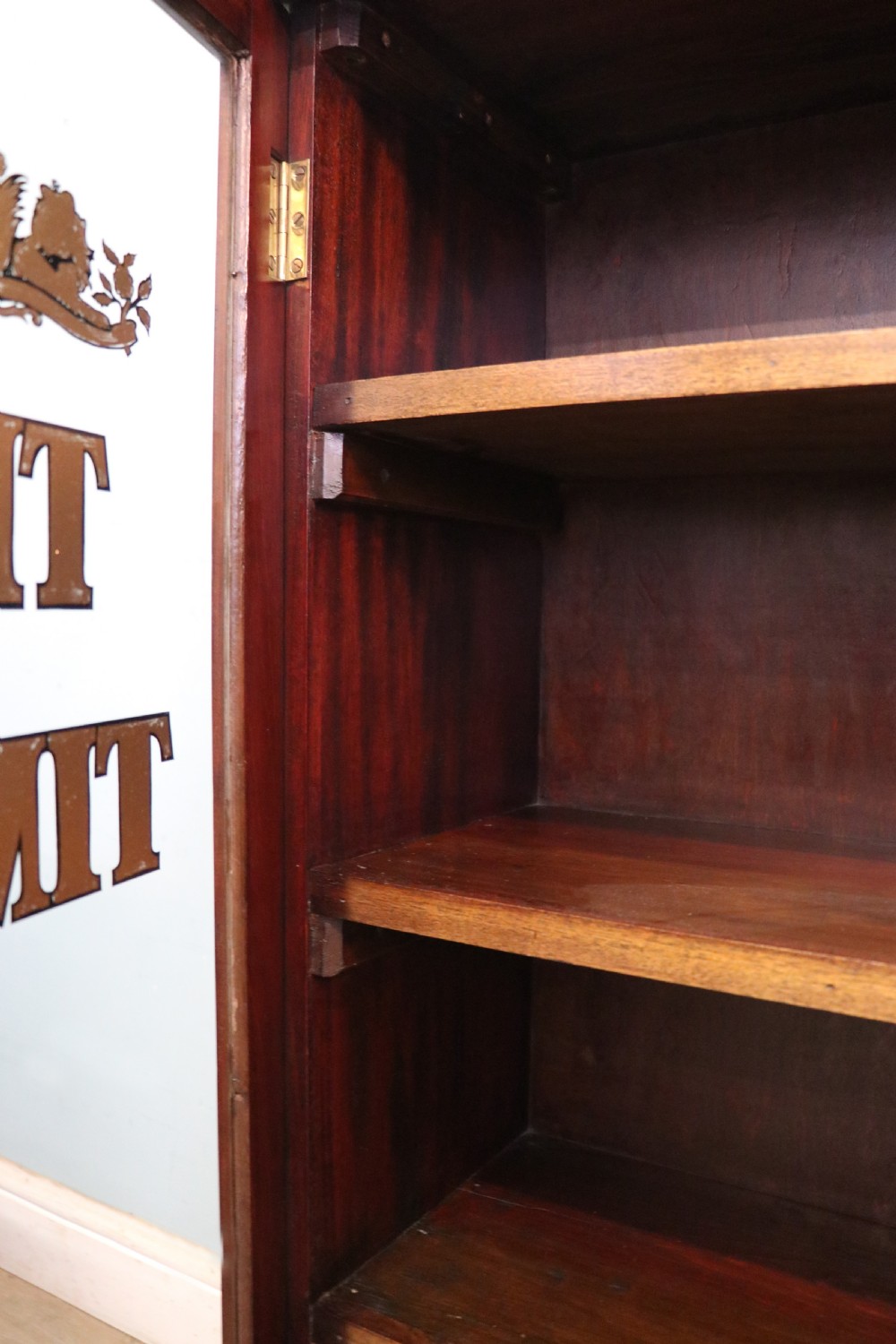 A wonderful late 19th display cabinet with sliding glass doors, later hand sign written for the Times and the Sunday Times. View XIII