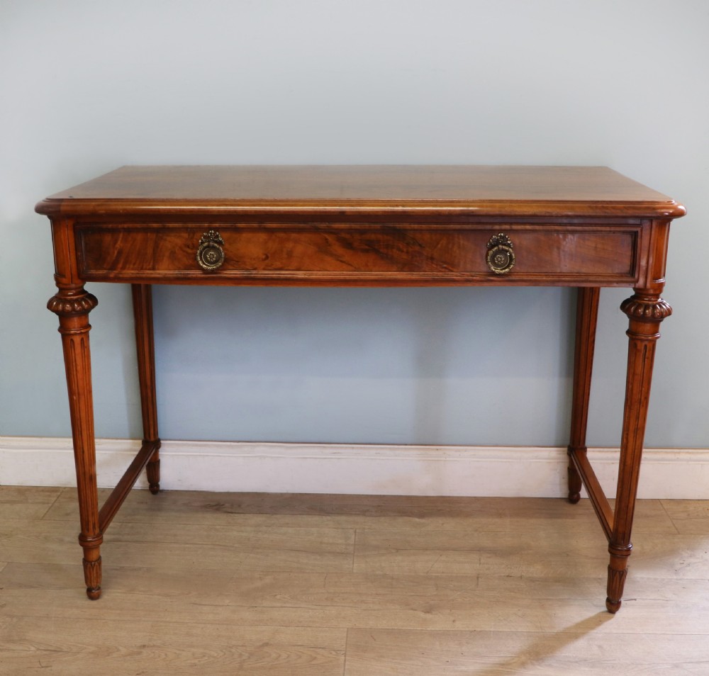 A lovely late 19th century mahogany side table, that retailers’ original label for Liberty of London.