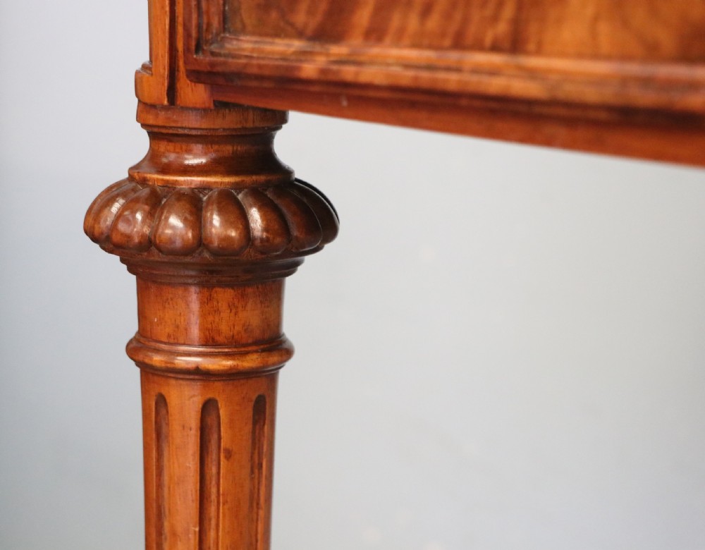 A lovely late 19th century mahogany side table, that retailers’ original label for Liberty of London. View XIV