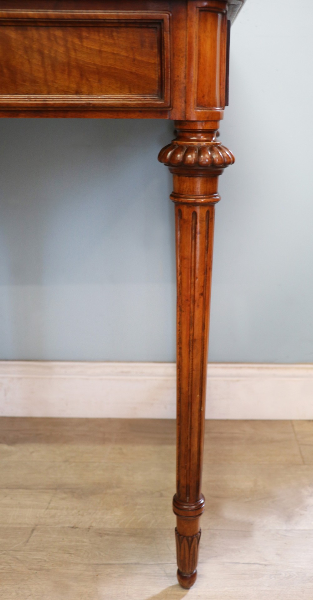 A lovely late 19th century mahogany side table, that retailers’ original label for Liberty of London. View XV