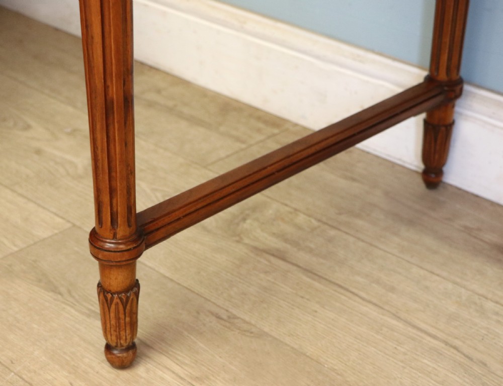 A lovely late 19th century mahogany side table, that retailers’ original label for Liberty of London. View XXIV