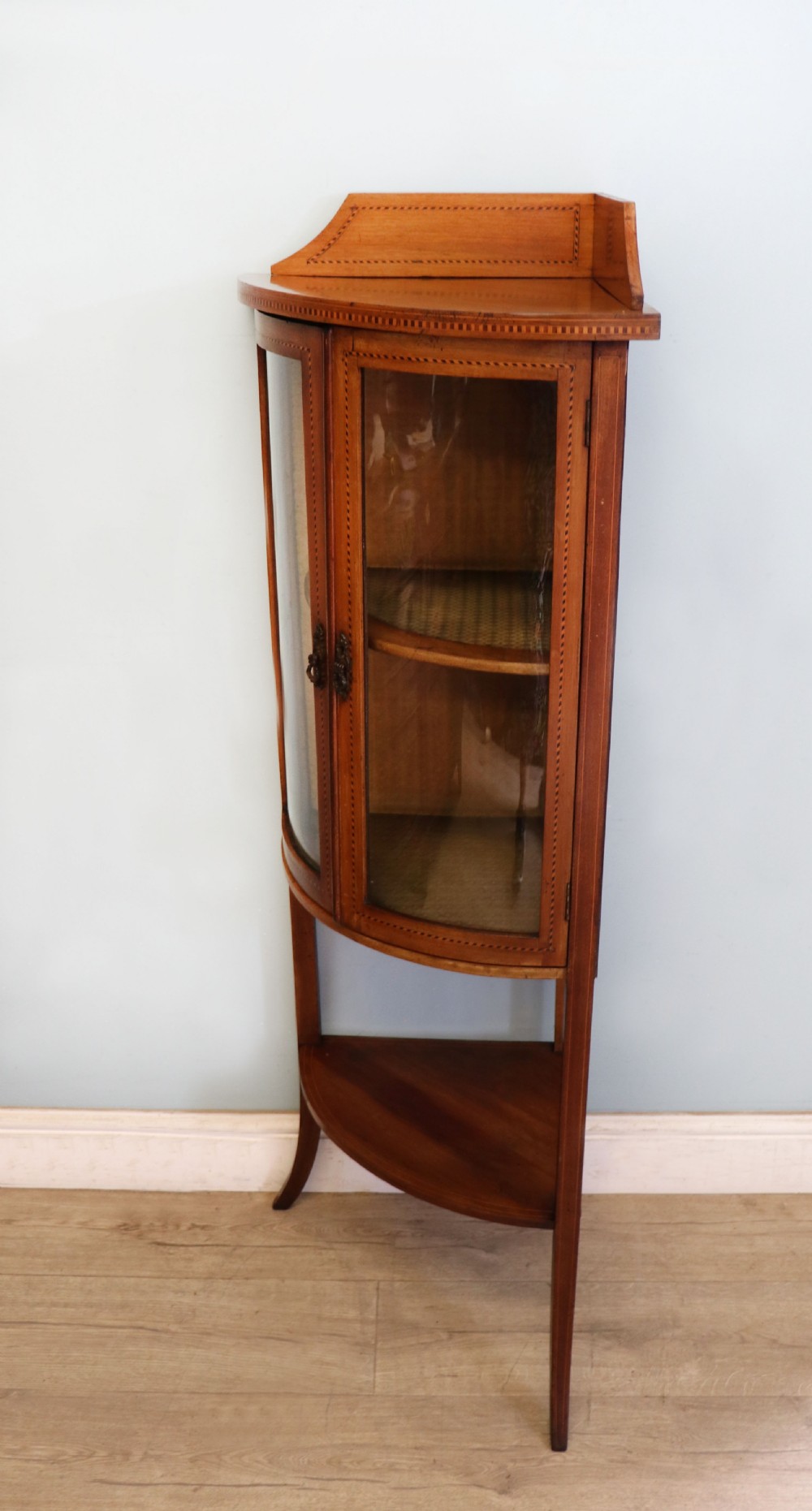  A lovely small Edwardian mahogany and inlaid corner display cabinet.  View IV
