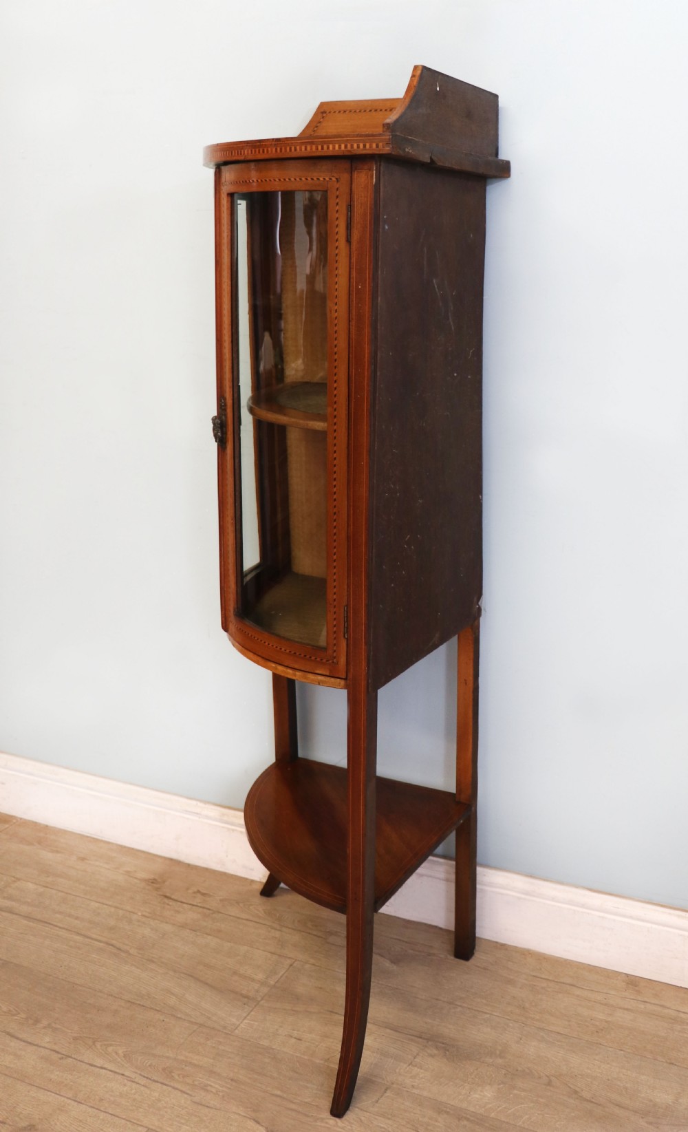  A lovely small Edwardian mahogany and inlaid corner display cabinet.  View V